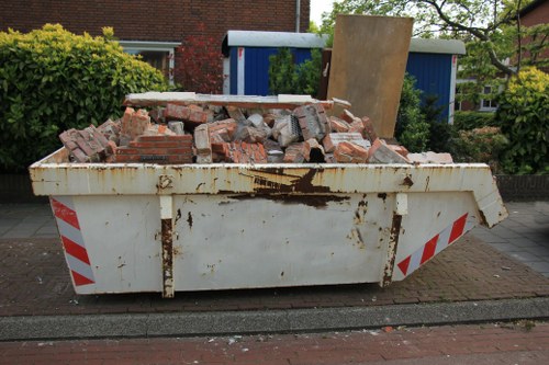Professional flat clearance team at work in Lee