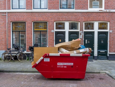 People disposing of old furniture in Lee